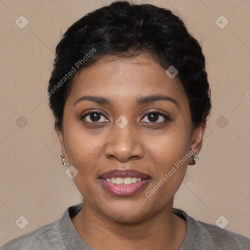 Joyful black young-adult female with short  black hair and brown eyes