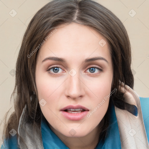 Joyful white young-adult female with medium  brown hair and blue eyes