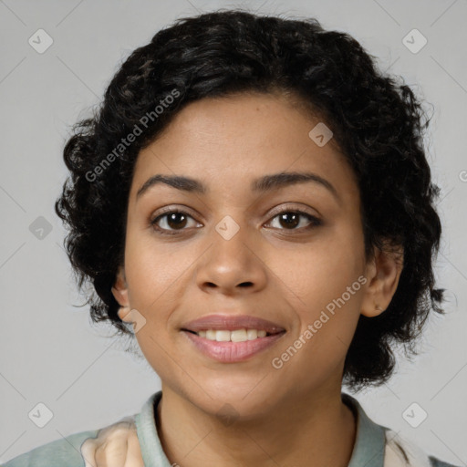 Joyful latino young-adult female with short  brown hair and brown eyes