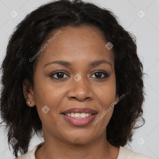 Joyful black young-adult female with medium  brown hair and brown eyes