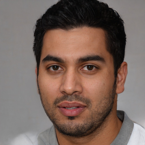 Neutral latino young-adult male with short  black hair and brown eyes