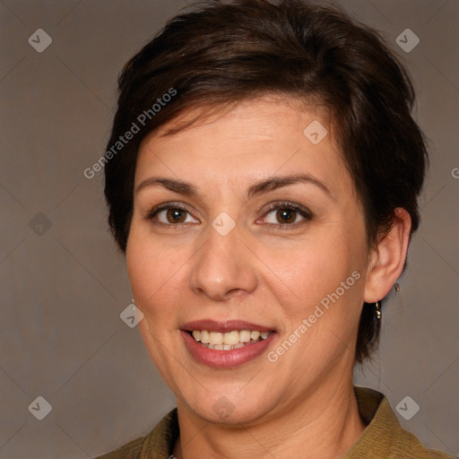 Joyful white adult female with medium  brown hair and brown eyes