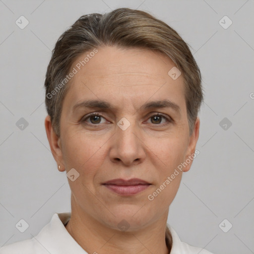 Joyful white adult female with short  brown hair and brown eyes