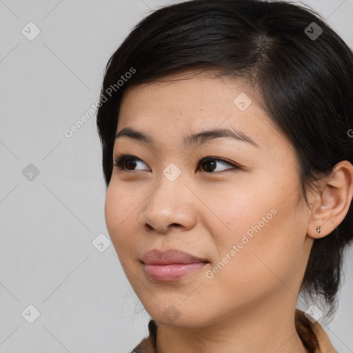 Neutral asian young-adult female with medium  brown hair and brown eyes