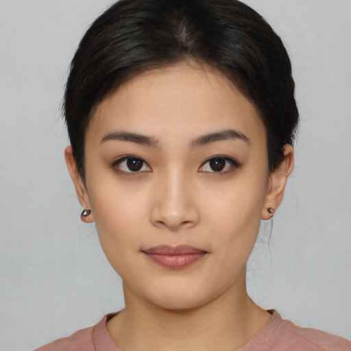 Neutral asian young-adult female with medium  black hair and brown eyes