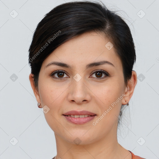 Joyful white young-adult female with medium  brown hair and brown eyes