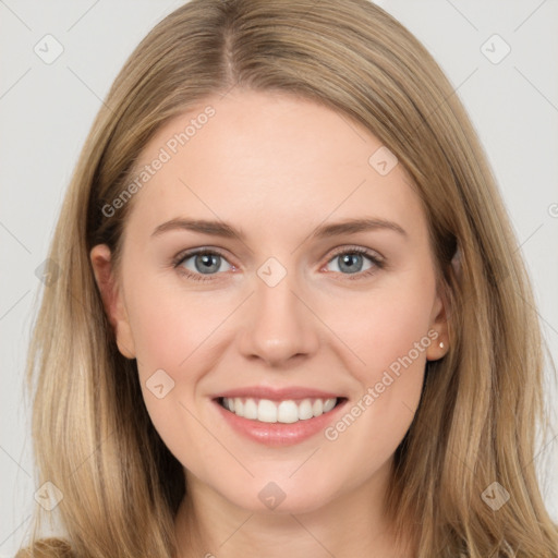 Joyful white young-adult female with long  brown hair and grey eyes