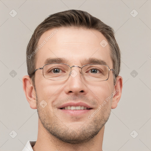 Joyful white adult male with short  brown hair and grey eyes