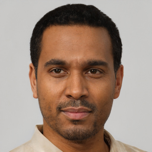Neutral black young-adult male with short  black hair and brown eyes
