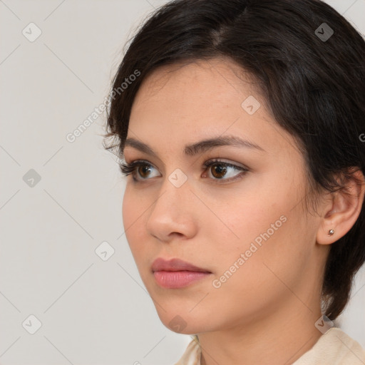 Neutral white young-adult female with medium  brown hair and brown eyes