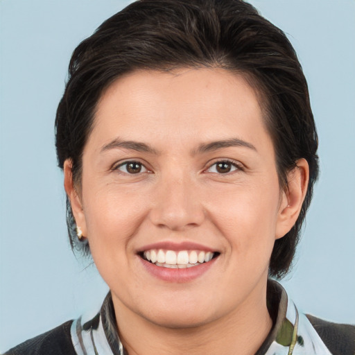 Joyful white young-adult female with medium  brown hair and brown eyes