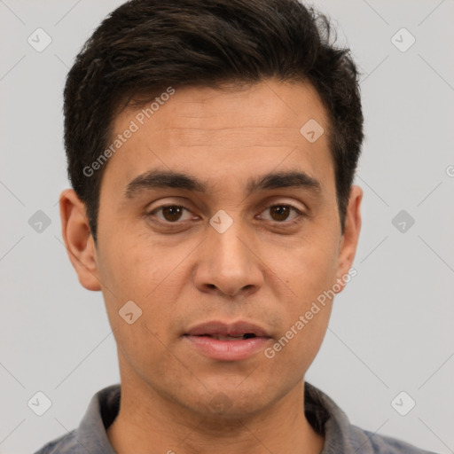 Joyful white adult male with short  brown hair and brown eyes