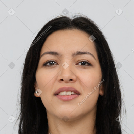 Joyful latino young-adult female with long  black hair and brown eyes