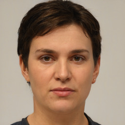 Neutral white young-adult female with short  brown hair and brown eyes