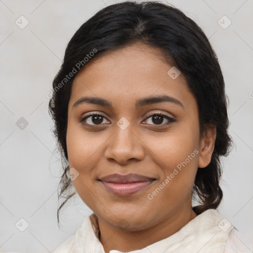 Joyful latino young-adult female with medium  brown hair and brown eyes