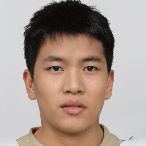 Neutral asian young-adult male with short  brown hair and brown eyes