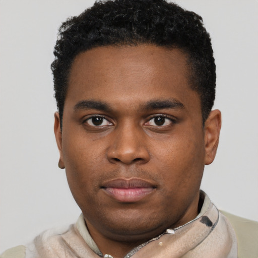 Neutral black young-adult male with short  brown hair and brown eyes