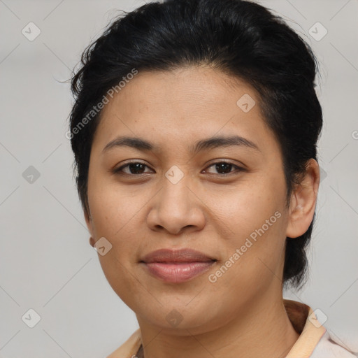 Joyful asian young-adult female with medium  brown hair and brown eyes