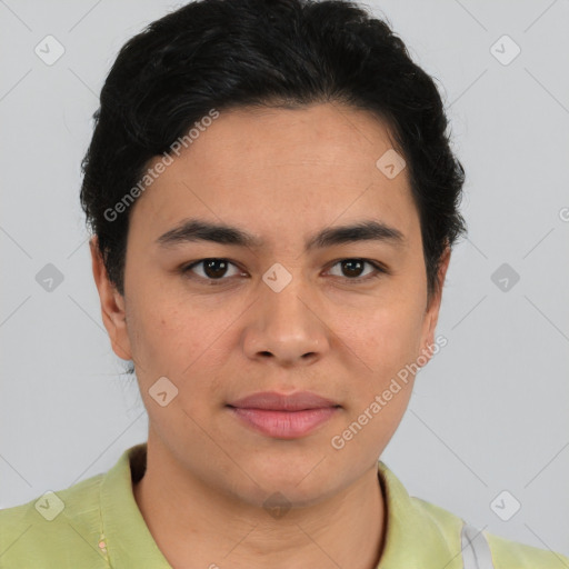 Joyful latino young-adult male with short  brown hair and brown eyes