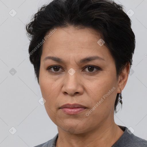 Joyful white adult female with short  brown hair and brown eyes