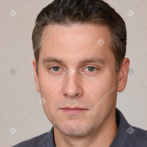 Neutral white adult male with short  brown hair and brown eyes