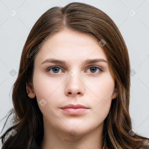 Neutral white young-adult female with long  brown hair and brown eyes