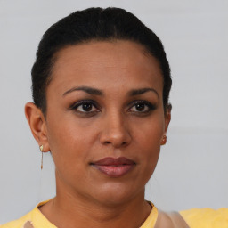 Neutral black young-adult female with short  brown hair and brown eyes