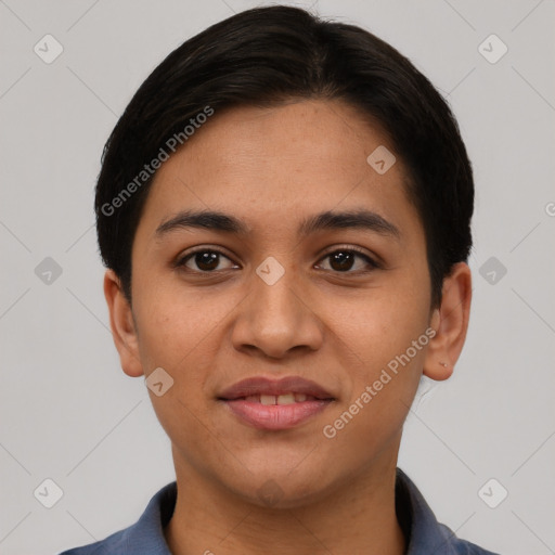 Joyful latino young-adult female with short  black hair and brown eyes