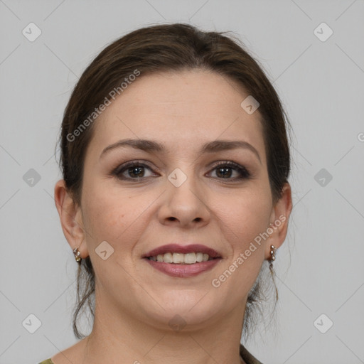 Joyful white young-adult female with medium  brown hair and grey eyes