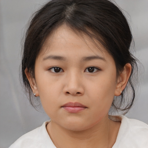 Neutral asian child female with medium  brown hair and brown eyes