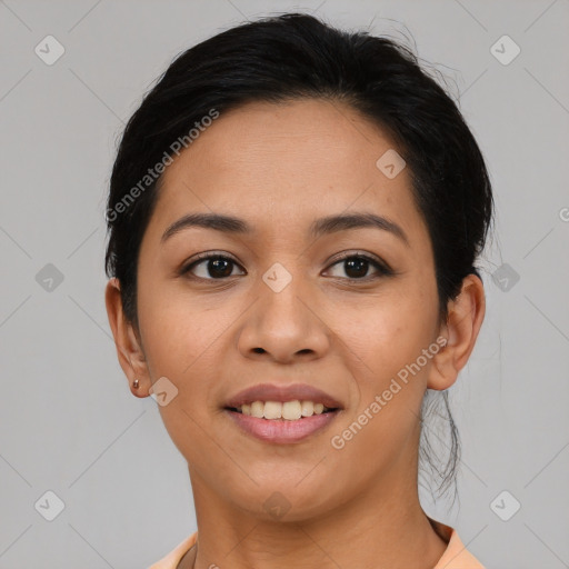 Joyful asian young-adult female with short  black hair and brown eyes