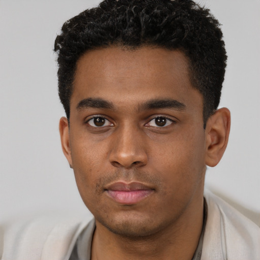 Neutral black young-adult male with short  brown hair and brown eyes