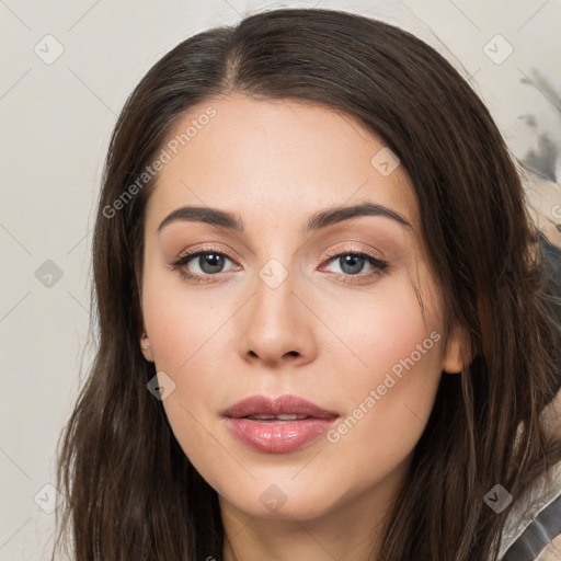 Neutral white young-adult female with long  brown hair and brown eyes