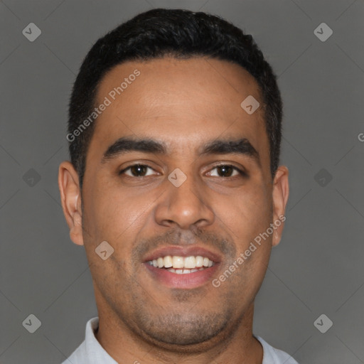 Joyful latino young-adult male with short  brown hair and brown eyes