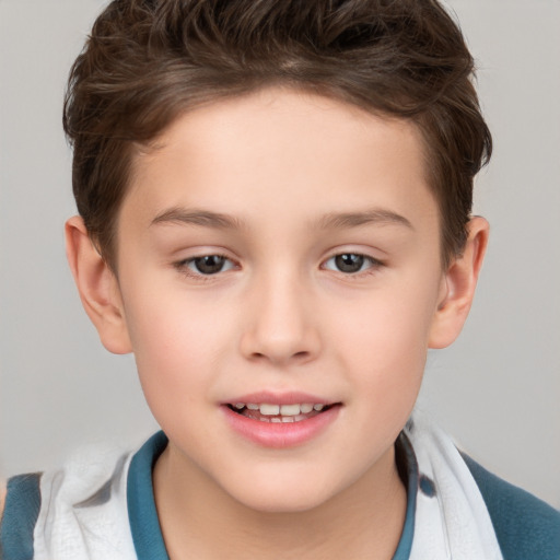 Joyful white child female with short  brown hair and brown eyes