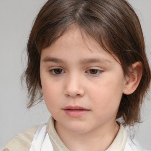 Neutral white child female with medium  brown hair and brown eyes