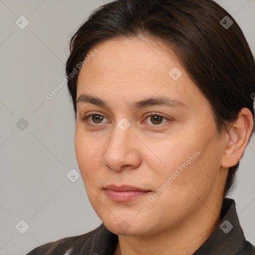 Joyful white adult female with short  brown hair and brown eyes