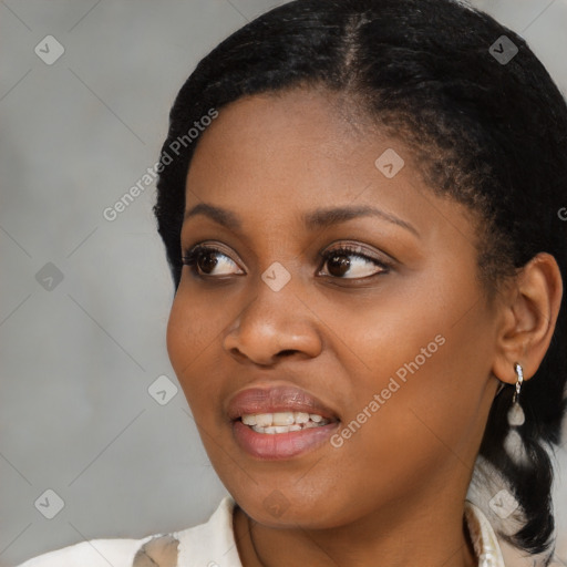 Joyful latino young-adult female with medium  black hair and brown eyes