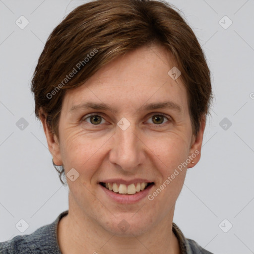 Joyful white adult female with short  brown hair and grey eyes