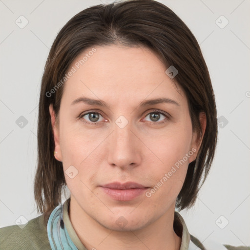 Neutral white young-adult female with medium  brown hair and grey eyes