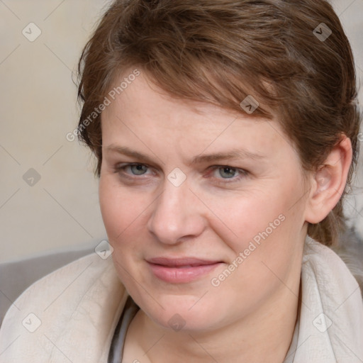 Joyful white young-adult female with medium  brown hair and blue eyes