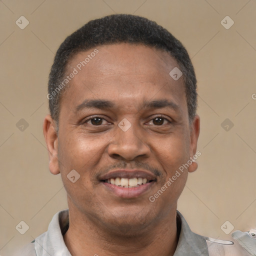Joyful latino adult male with short  black hair and brown eyes