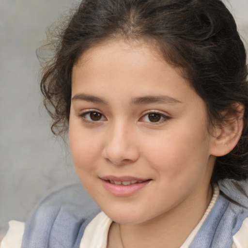 Joyful white child female with medium  brown hair and brown eyes