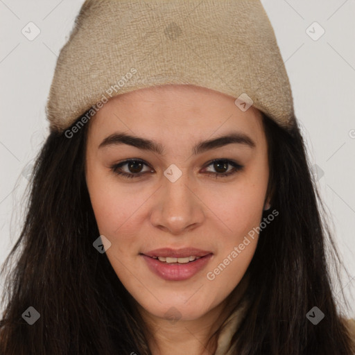 Joyful asian young-adult female with long  brown hair and brown eyes