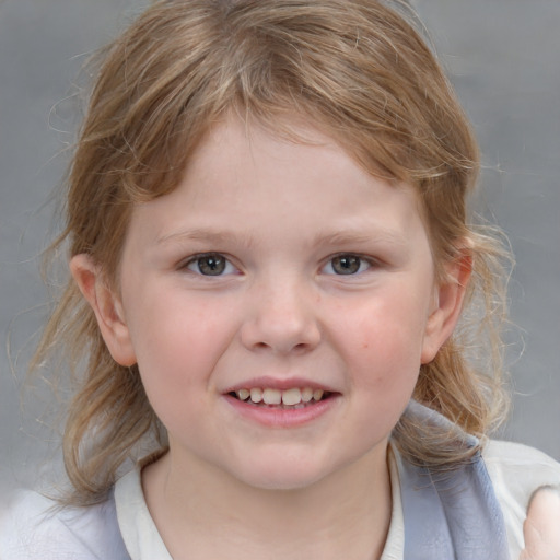 Joyful white child female with medium  brown hair and grey eyes