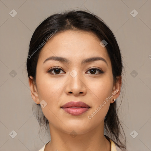 Joyful latino young-adult female with medium  brown hair and brown eyes