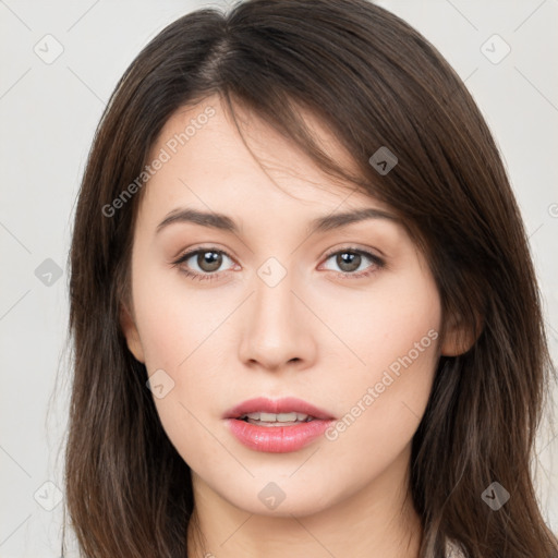 Neutral white young-adult female with long  brown hair and brown eyes