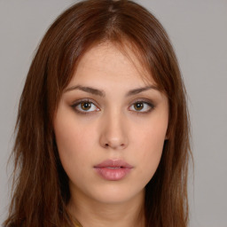 Neutral white young-adult female with long  brown hair and brown eyes