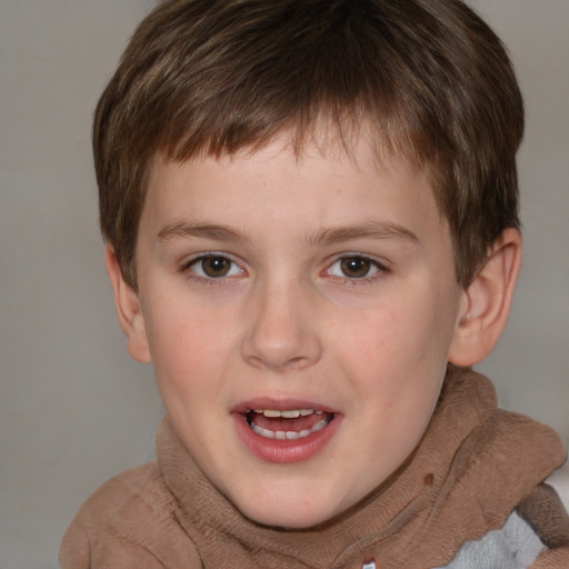 Joyful white child male with short  brown hair and brown eyes