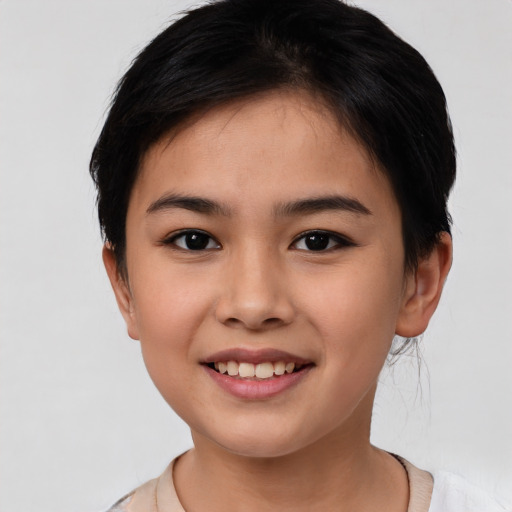 Joyful asian young-adult female with short  black hair and brown eyes